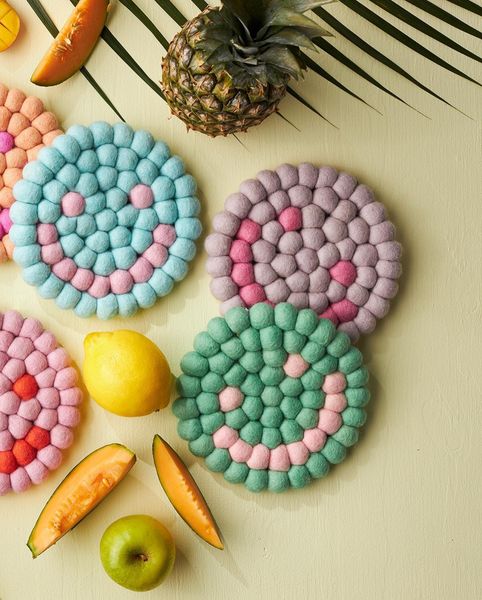 Hovedbilde KJELEUNDERLAG I ULL – Rund Smiley Apple – Aveva ...