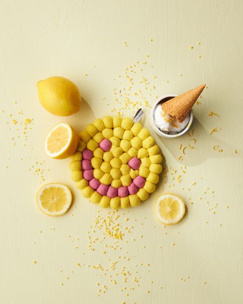 Hovedbilde KJELEUNDERLAG I ULL – Rund Smiley Lemon – Aveva ...